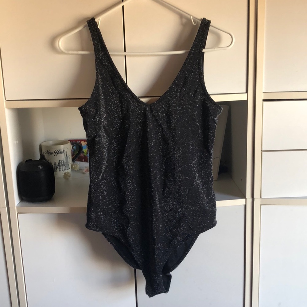sparkly black body suit
